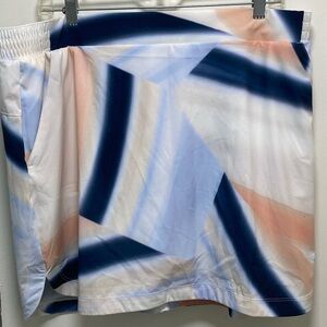 Calia, XL,striking Skirt Set with built in mesh shorts and lots of pockets. NWT